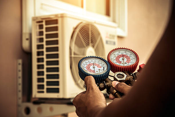 Professional Heat Pump Repair technician working in Attica, MI